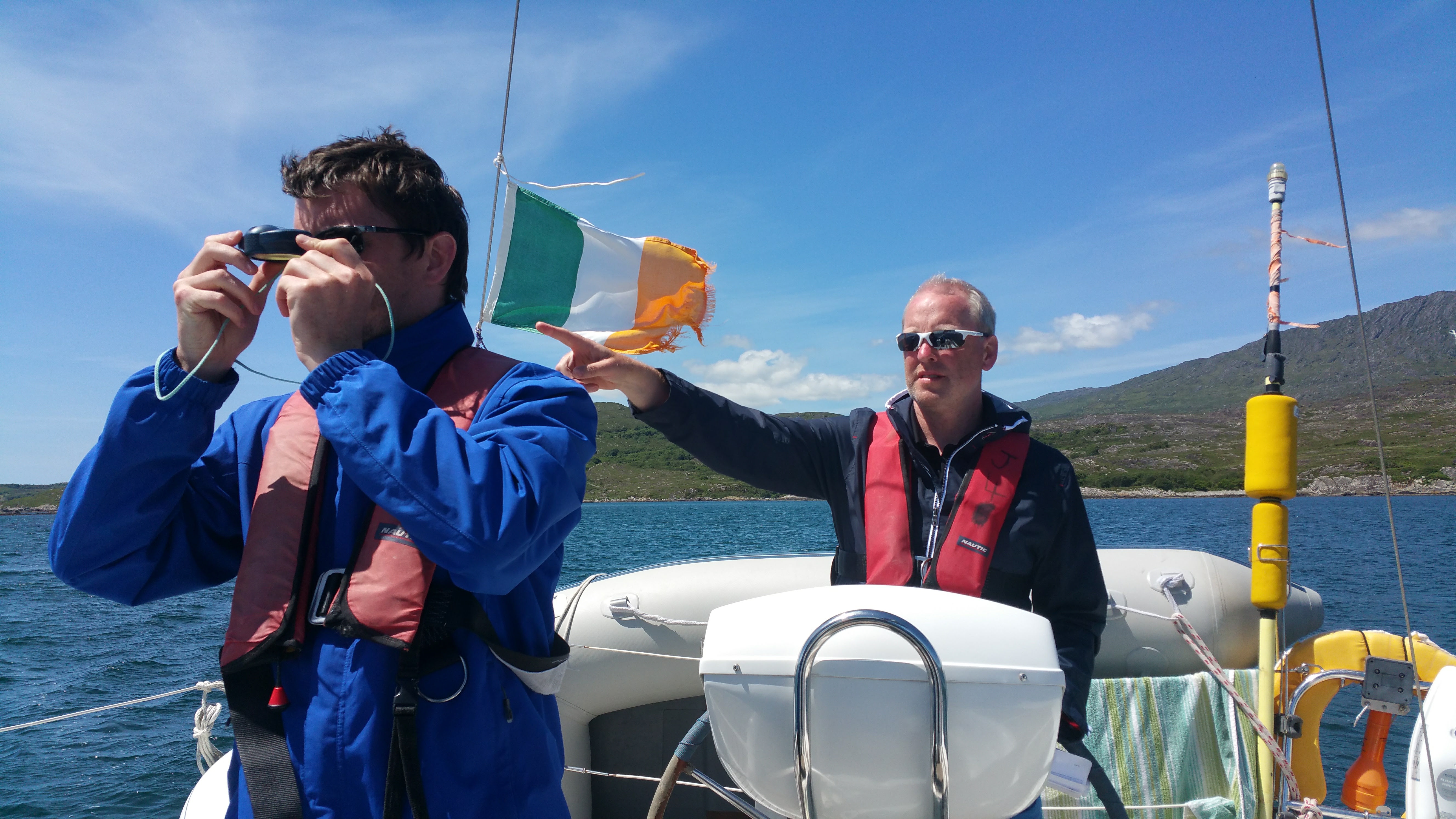 men at helm